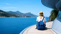 Tourist with backpack on a yacht